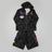 Black tracksuit with colorful patches on a marble surface